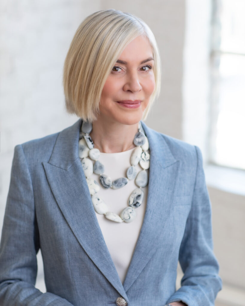 professional woman in a blue suit