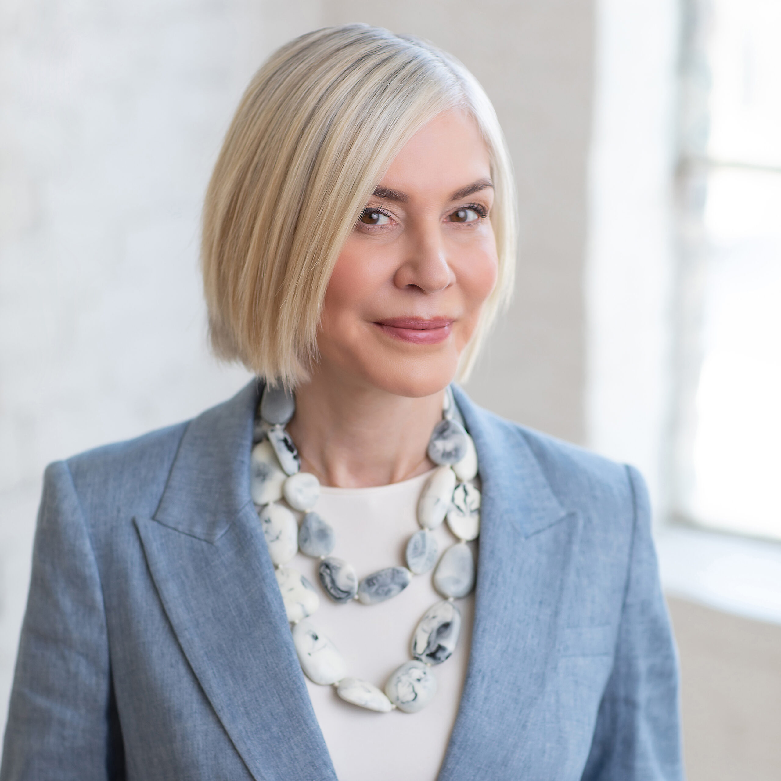 professional woman in a blue suit
