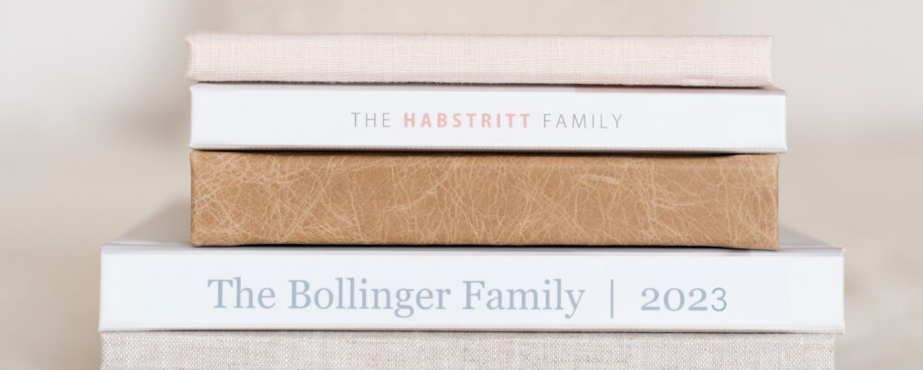 A stack of 4 photo books.