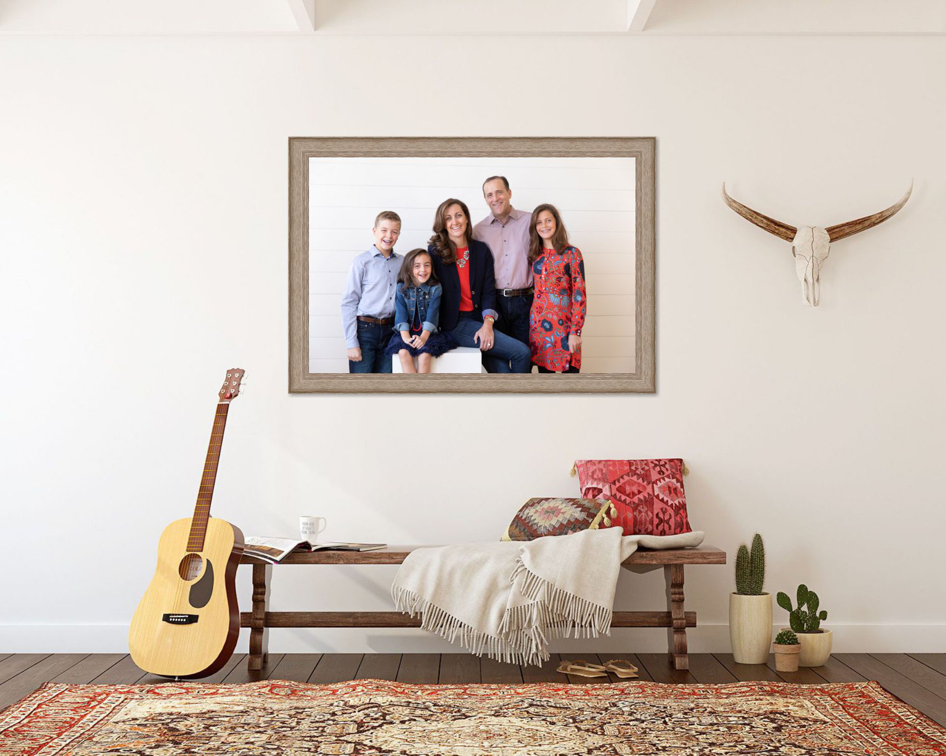 Framed photo of a family of five. Home foyer setup.