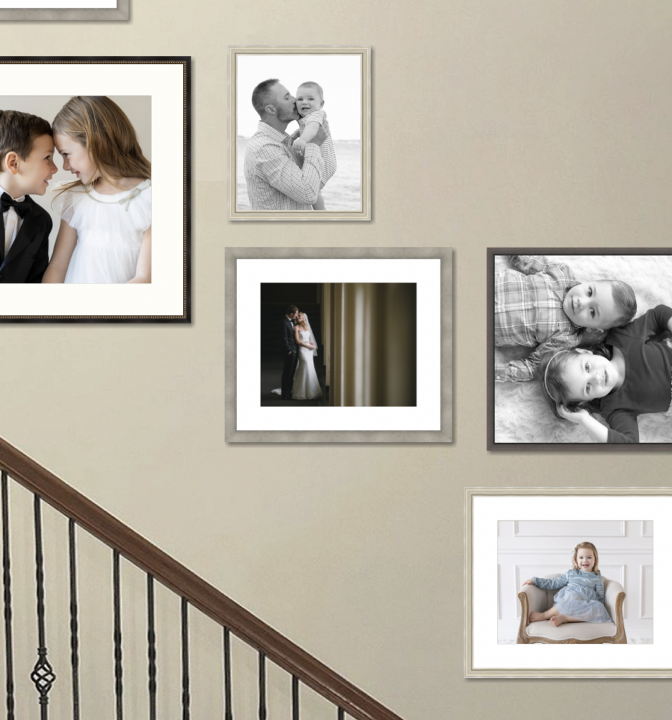 Close up detail of frames to be hung on family wall.